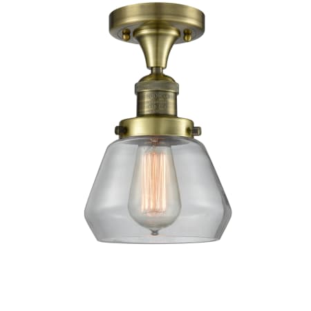 A large image of the Innovations Lighting 517 Fulton Antique Brass / Clear