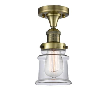 A large image of the Innovations Lighting 517 Small Canton Antique Brass / Clear