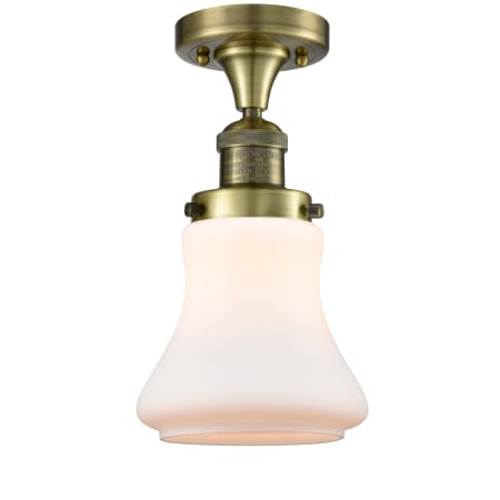 A large image of the Innovations Lighting 517-1CH Bellmont Antique Brass / Matte White