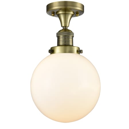 A large image of the Innovations Lighting 517-1CH-8 Beacon Antique Brass / Matte White Cased