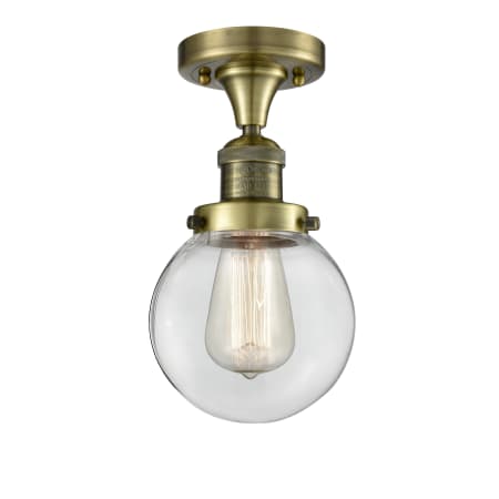A large image of the Innovations Lighting 517-1CH-6 Beacon Antique Brass / Clear