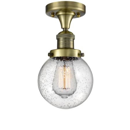 A large image of the Innovations Lighting 517-1CH-6 Beacon Antique Brass / Seedy