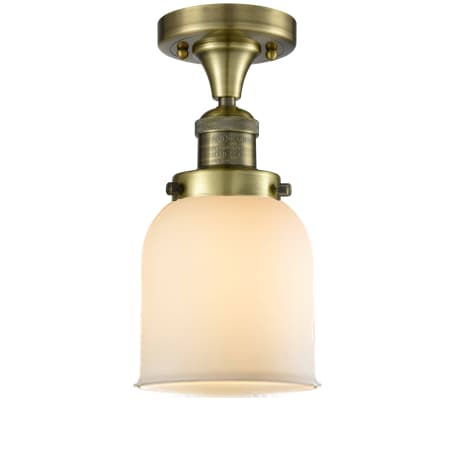 A large image of the Innovations Lighting 517-1CH / Small Bell Antique Brass / Matte White Cased
