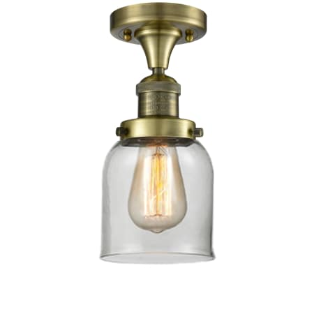 A large image of the Innovations Lighting 517-1CH / Small Bell Antique Brass / Clear