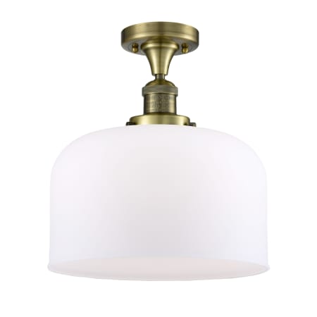 A large image of the Innovations Lighting 517 X-Large Bell Antique Brass / Matte White