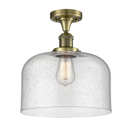 A large image of the Innovations Lighting 517 X-Large Bell Antique Brass / Seedy