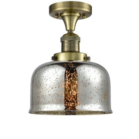 A large image of the Innovations Lighting 517-1CH Large Bell Antique Brass / Silver Mercury