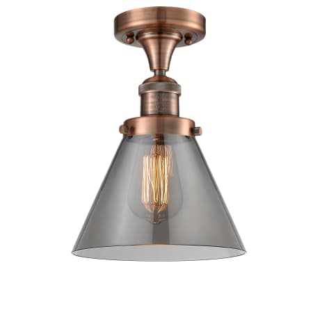 A large image of the Innovations Lighting 517-1CH Large Cone Antique Copper / Smoked