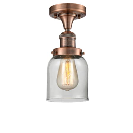 A large image of the Innovations Lighting 517-1CH Small Bell Antique Copper / Clear