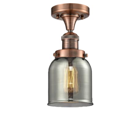 A large image of the Innovations Lighting 517-1CH Small Bell Antique Copper / Smoked