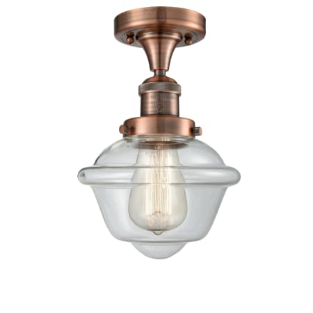 A large image of the Innovations Lighting 517-1CH Small Oxford Antique Copper / Clear