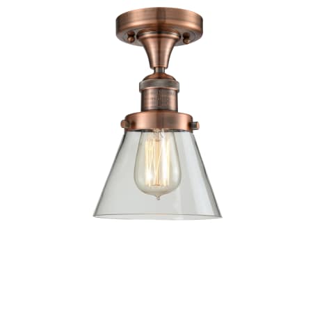 A large image of the Innovations Lighting 517-1CH Small Cone Antique Copper / Clear