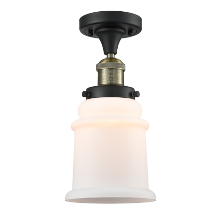 A large image of the Innovations Lighting 517-1CH Canton Black / Antique Brass / Matte White Cased