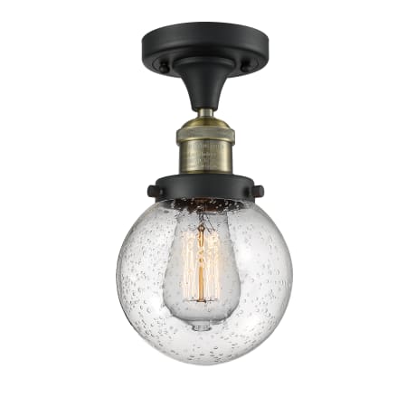 A large image of the Innovations Lighting 517-1CH-6 Beacon Black Antique Brass / Seedy