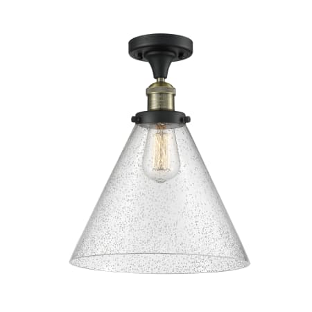 A large image of the Innovations Lighting 517 X-Large Cone Black Antique Brass / Seedy