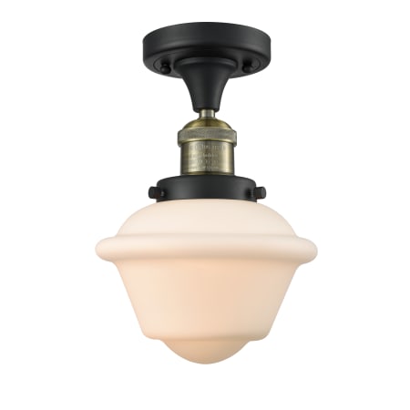 A large image of the Innovations Lighting 517-1CH Small Oxford Black Antique Brass / Matte White Cased