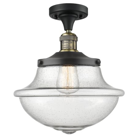 A large image of the Innovations Lighting 517 Large Oxford Black Antique Brass / Seedy