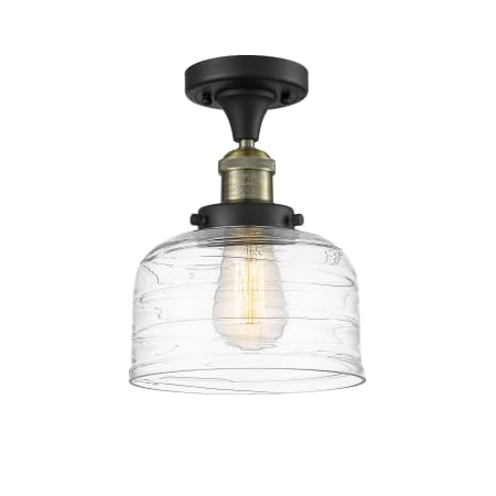 A large image of the Innovations Lighting 517-1CH-12-8 Bell Semi-Flush Black Antique Brass / Clear Deco Swirl