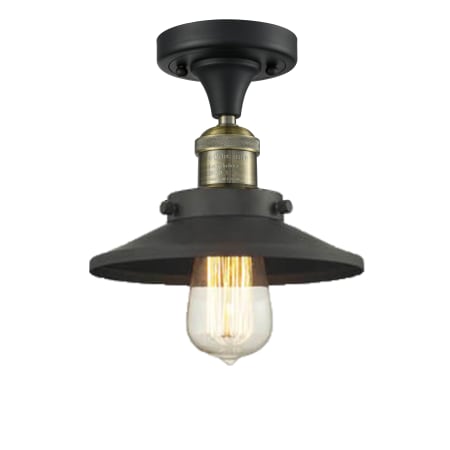 A large image of the Innovations Lighting 517-1CH Railroad Black Antique Brass / Matte Black