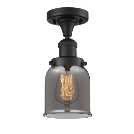 A large image of the Innovations Lighting 517-1CH Small Bell Matte Black / Plated Smoked