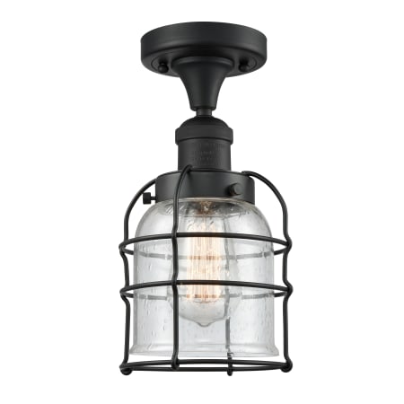 A large image of the Innovations Lighting 517 Small Bell Cage Matte Black / Seedy