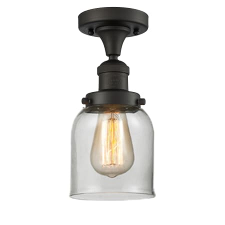 A large image of the Innovations Lighting 517-1CH Small Bell Oiled Rubbed Bronze / Clear