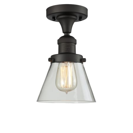 A large image of the Innovations Lighting 517-1CH Small Cone Oiled Rubbed Bronze / Clear