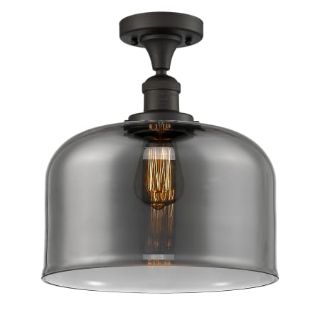 A large image of the Innovations Lighting 517 X-Large Bell Oil Rubbed Bronze / Plated Smoke