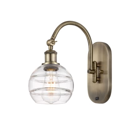 A large image of the Innovations Lighting 518-1W-11-6 Rochester Sconce Antique Brass / Clear