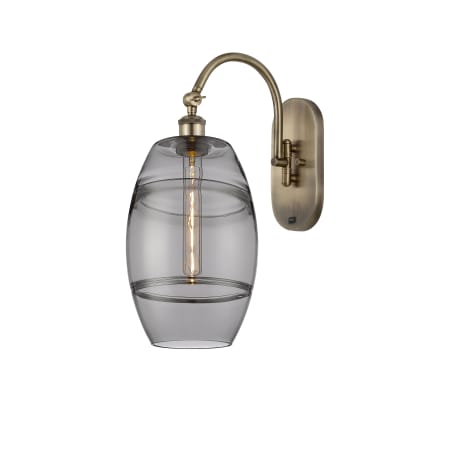 A large image of the Innovations Lighting 518-1W-13-8 Vaz Sconce Antique Brass / Smoked