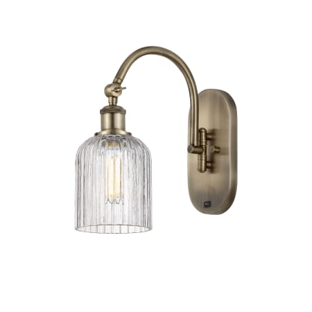 A large image of the Innovations Lighting 518-1W-13-5 Bridal Veil Sconce Antique Brass / Clear