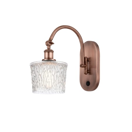 A large image of the Innovations Lighting 518-1W-12-7 Niagra Sconce Antique Copper / Clear