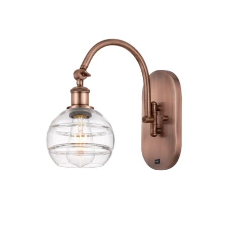 A large image of the Innovations Lighting 518-1W-11-6 Rochester Sconce Antique Copper / Clear