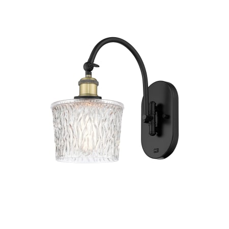 A large image of the Innovations Lighting 518-1W-12-7 Niagra Sconce Black Antique Brass / Clear