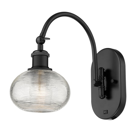 A large image of the Innovations Lighting 518-1W-11-6 Ithaca Sconce Matte Black / Clear Ithaca