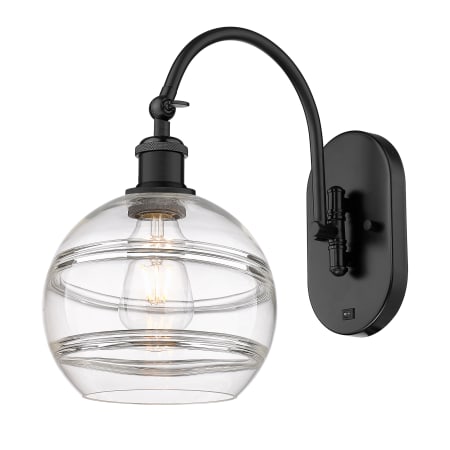 A large image of the Innovations Lighting 518-1W-13-8 Rochester Sconce Matte Black / Clear