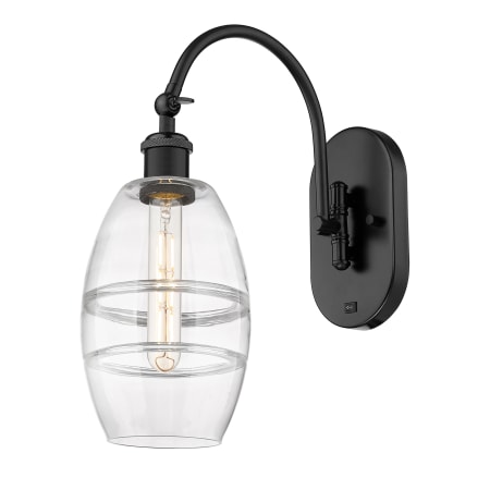 A large image of the Innovations Lighting 518-1W-12-6 Vaz Sconce Matte Black / Clear