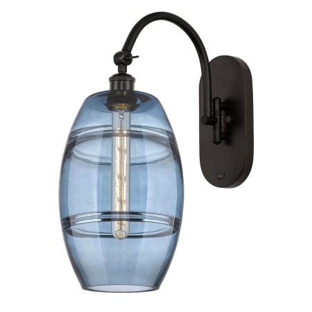 A large image of the Innovations Lighting 518-1W-13-8 Vaz Sconce Oil Rubbed Bronze / Blue
