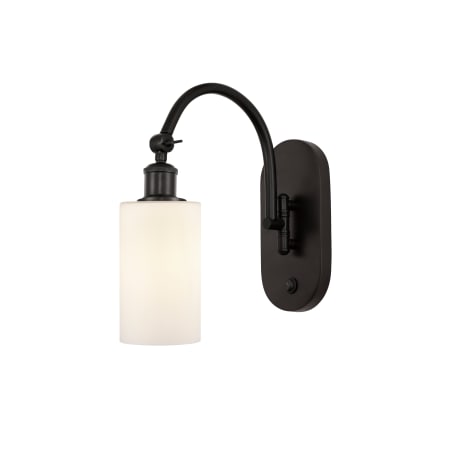 A large image of the Innovations Lighting 518-1W-13-5 Clymer Sconce Oil Rubbed Bronze / Matte White