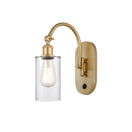 A large image of the Innovations Lighting 518-1W-13-5 Clymer Sconce Satin Gold / Clear