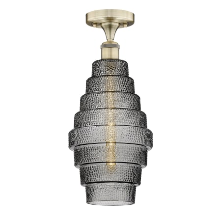 A large image of the Innovations Lighting 616-1F-18-8 Cascade Flush Antique Brass / Smoked