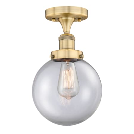 A large image of the Innovations Lighting 616-1F-9-8 Beacon Semi-Flush Brushed Brass / Clear