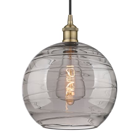 A large image of the Innovations Lighting 616-1P 13 12 Athens Deco Swirl Pendant Antique Brass / Light Smoke Deco Swirl