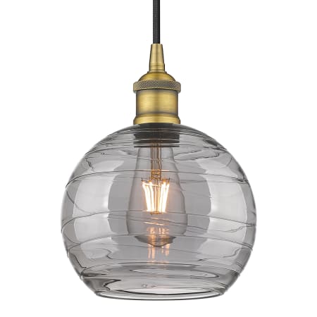 A large image of the Innovations Lighting 616-1P 10 8 Athens Deco Swirl Pendant Brushed Brass / Light Smoke Deco Swirl