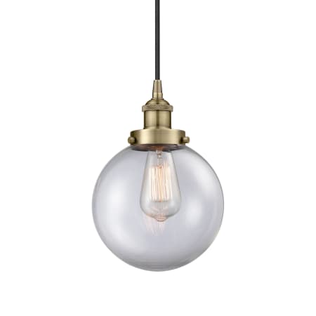A large image of the Innovations Lighting 616-1PH-12-8 Beacon Pendant Antique Brass / Clear