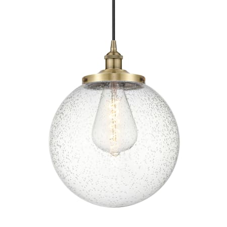 A large image of the Innovations Lighting 616-1PH-18-14 Beacon Pendant Antique Brass / Seedy