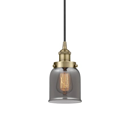 A large image of the Innovations Lighting 616-1PH-10-5 Bell Pendant Antique Brass / Plated Smoke