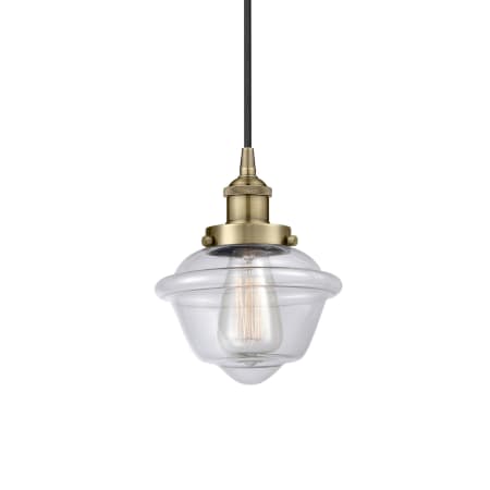 A large image of the Innovations Lighting 616-1PH-10-8 Oxford Pendant Antique Brass / Clear