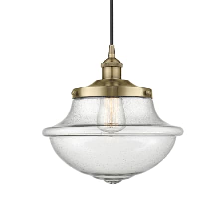 A large image of the Innovations Lighting 616-1PH-12-12 Oxford Pendant Antique Brass / Seedy