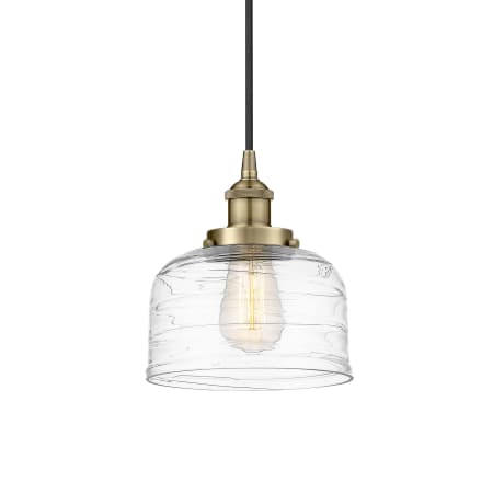 A large image of the Innovations Lighting 616-1PH-10-8 Bell Pendant Antique Brass / Clear Deco Swirl